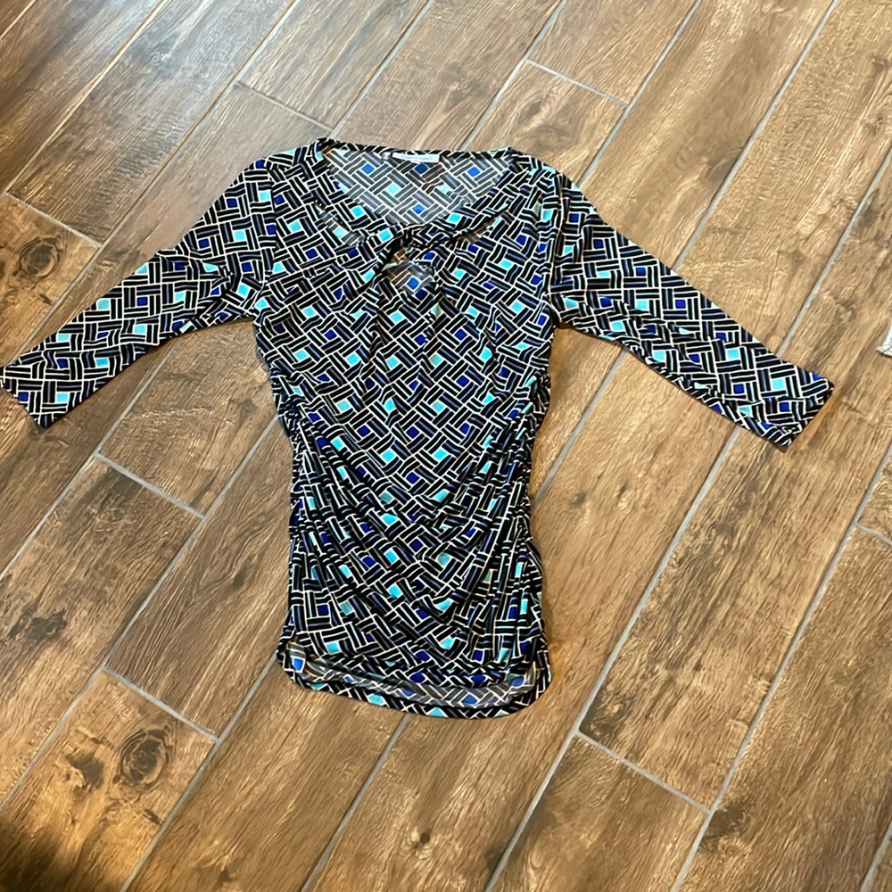 Jennifer Lopez work top. With cutout design.